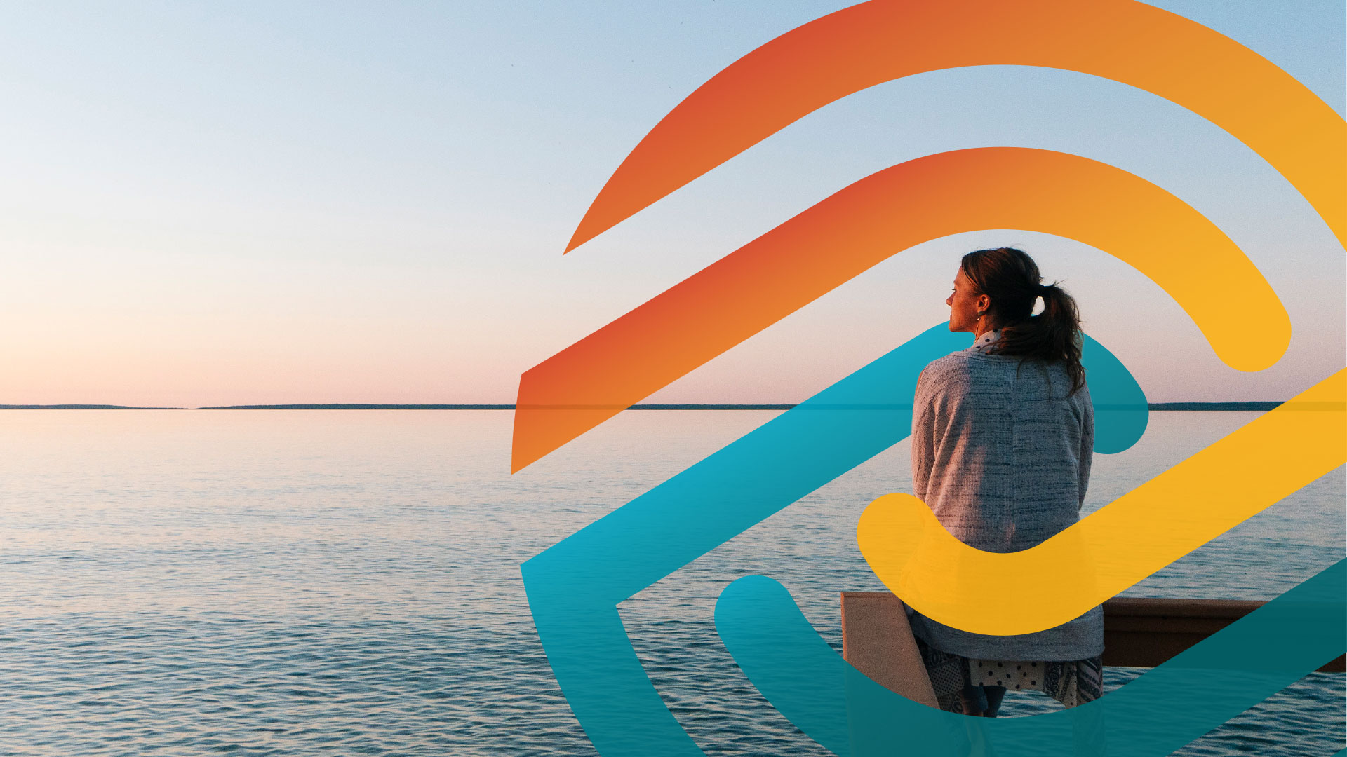 woman looking out at lake
